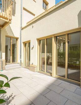 AIGNER - Erstbezug - 4-Zimmer-Erdgeschosswohnung mit sonniger Terrasse im St.-Benno-Viertel - München