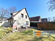 Idyllisches Einfamilienhaus mit Vollkeller in zentrumsnaher Wohnlage - Ahrensburg