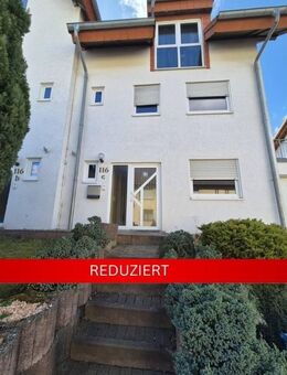 vermietetes Reihenendhaus mit kleinem Grundstück als lukrative Investitionsmöglichkeit - Queidersbach