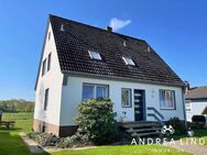 Ferienhaus mit 3 vermietbaren Ferienwohnungen und Baugrundstück im Grünen - Cuxhaven