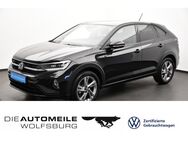 VW Taigo, 1.0 TSI R-Line, Jahr 2023 - Wolfsburg