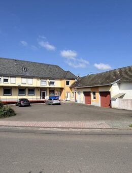 Vermietetes Mehrfamilienhaus mit Gewerbeeinheit - Großlittgen