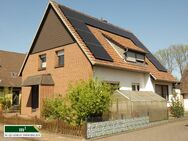 Einfamilienhaus mit Einliegerwohnung auf großem Eigentumsgrundstück in Zentrumsnähe von Versmold - Versmold