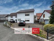 Einfamilienhaus mit zwei Garagen und separatem Gartengrundstück in Ulrichstein-Wohnfeld - Ulrichstein