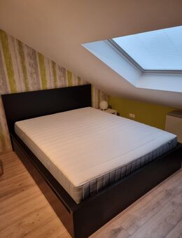 Neuwertiges 160×200 cm Holzbett in schwarz - Gladbeck