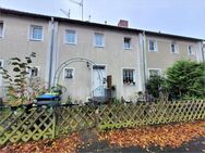 Vermietetes Reihenmittelhaus mit Garage und Garten in Celle - Celle