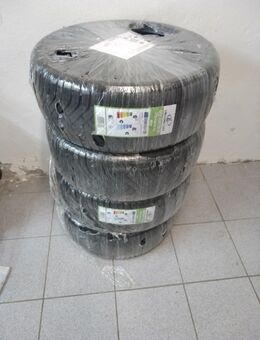 Vier neue Ganzjahresreifen - Neuss