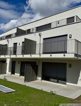 Modernes Wohnen im Erstbezug: 2 Zimmer-EG mit Terrasse, Garten & fußläufig zum See - Ebersberg