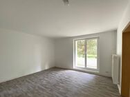 Sonnige Wohnung mit eigenem Garten, ideal geschnitten, ohne Provision - Rauen