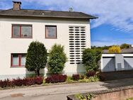Zweifamilienhaus mit 2 Eigentumswohnungen, 7 Zimmern, ca. 146 m2 Wohnfläche, 2 Balkone, schönem Garten und 2 Garagen - Trier