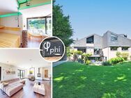 PHI AACHEN - Sonnenverwöhntes Wohnglück mit Einliegerwohnung, Spa-Bereich und Garagen in Aachen! - Aachen