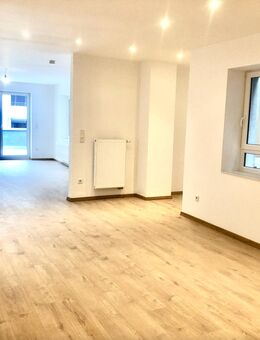 Vermietete, hochmodernisierte Dachgeschosswohnung – eine hervorragende Investitionsmöglichkeit! - Kitzingen