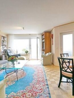 Rheinberg-Budberg: Solide vermietete Dachgeschosswohnung mit Balkon - Rheinberg