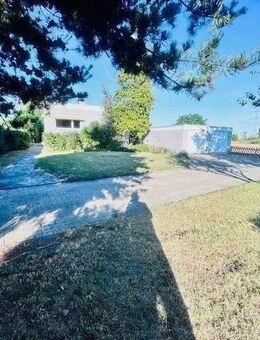 Freistehender Bungalow mit Weitblick, Aufstockungsmöglichkeit und Baugrundstück - Jülich