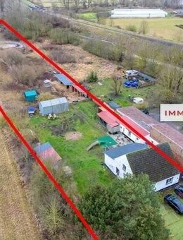 IMMOBERLIN.DE - Für Pferdeliebhaber! Haus mit Nebengebäuden & Potential auf großem Grundstück in ländlicher Lage - Seelow