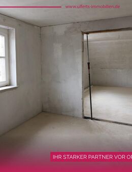 Moderne Dachgeschosswohnung in zentraler Wohnlage von Warsingsfehn - Moormerland