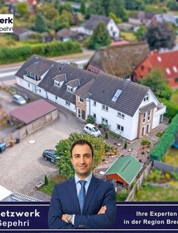 Moderne 3-Zimmer-Erdgeschosswohnung mit Einbauküche und Garten in Syke-Barrien - Syke