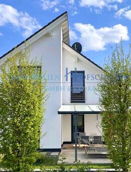 K 497 - MODERN - ZEITLOS - STILVOLL - Junges Einfamilienhaus mit Doppelpultdach und Garage auf parkähnlichem Grundstück! - Bedburg