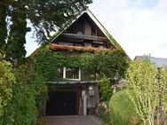 Einfamilienhaus mit Teilkeller und Garage - Breklum