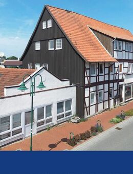 Zwei Häuser, eine Idee - solider Ertrag im Herzen von Uchte - Uchte