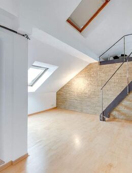 AIGNER - Lichtdurchflutete Dachgeschosswohnung in ruhiger Lage von Gilching - Gilching