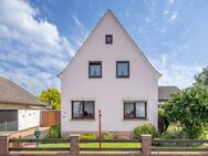 Teilunterkellertes Einfamilienhaus mit Garage und Wintergarten - Bremen
