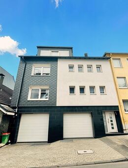 Einzigartiges Mehrfamilienhaus mit einem großzügigem Loft und Garagen mitten im Stadtzentrum. - Remscheid