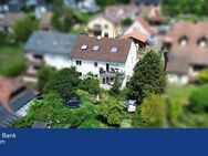 Attraktive Doppelhaushälfte in Rottenbauer - 3 vermietete Einheiten auf großzügigem Grundstück - Würzburg
