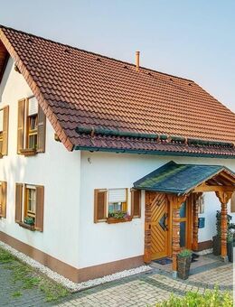 Ansprechendes und vermietetes Einfamilienhaus mit hübsch angelegtem Gartengrundstück und Garage! - Birken-Honigsessen