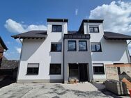 Erstbezug! Moderne 2-Zimmer-Dachgeschosswohnung mit Balkon in zentraler Lage von Seelscheid - Neunkirchen-Seelscheid