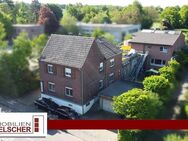Attraktives Wohn- und Geschäftshaus mit 4 Wohn- und 2 Gewerbeeinheiten in idyllischer Lage - Übach-Palenberg