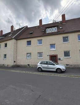 Solides Doppelhaus mit zwölf Wohneinheiten und neuer Heizungsanlage in Wiesau zu verkaufen - Wiesau