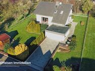 RAIFFEISEN IMMOBILIEN | Hochwertiges Wohnhaus in gefragter Lage von Großenritte sucht neue Eigentümer. - Baunatal