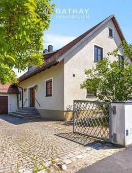 Familienfreundliches Einfamilienhaus mit traumhaftem Garten in der Regensburger Konradsiedlung - Regensburg
