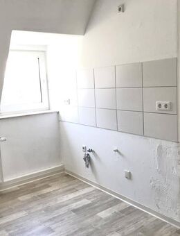 Die perfekte Single-Wohnung! Dachgeschoss-Wohnung mit Tageslichtbad frei! - Rheda-Wiedenbrück