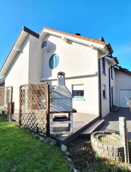 Stimmungsvolle Architektur: Einfamilienhaus mit Südgarten und Garage. - Beckum