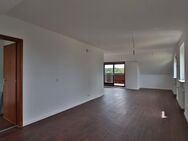 Einziehen und wohlfühlen: 3,5-Zimmer-Wohnung mit Dachloggia und Garage - Korntal-Münchingen