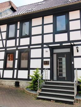 Modernisiertes Einfamilienhaus mit Einliegerwohnung und großem Garten - Kalefeld