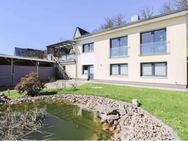 Modernes Einfamilienhaus mit viel Komfort - Moorgrund