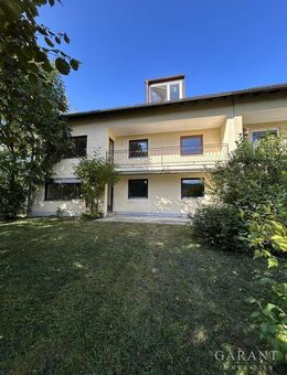 Großzügiges Dreifamilienhaus mit sonnigem Garten und Doppelgarage in begehrter Nachbarschaft - Gröbenzell