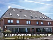Achim - Baden | Vollvermietetes Wohn- und Geschäftshaus in zentraler Lage - Achim