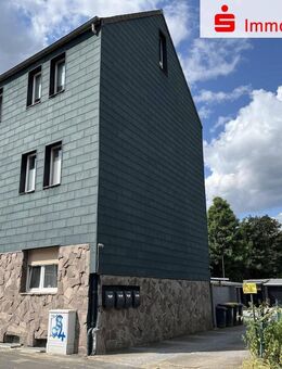 4-Familienhaus mit Gartenparadies und Garagenhof - Herten
