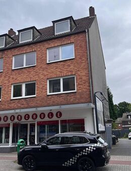 Entwicklungspotenzial! Wohn- und Geschäftshaus mit einem Anbau und Garagen in zentraler Lage! - Herten