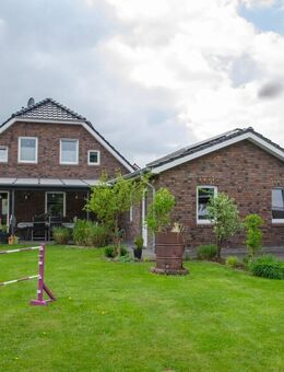 "Nachhaltig wohnen in Langholt: KfW55-Einfamilienhaus mit PV-Anlage" - Rhauderfehn