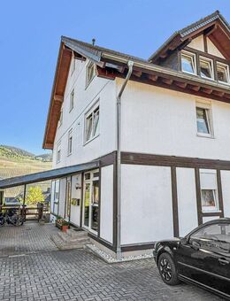 Lösnich: Attraktive 4-Zimmer-Eigentumswohnung in einer gepflegten Doppelhaushälfte, ruhige Wohnlage - Lösnich