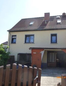 Haus in echter Ortsrandlage , ruhig gelegen mit Innenhof, Garage und kleiner Werkstatt - Erbenhausen