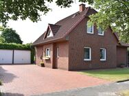 Modernes Einfamilienhaus in familienfreundlicher Lage, 5 Zimmer, großer Garten, überd. Terrasse, Doppelgarage und Kaminofen - Bücken