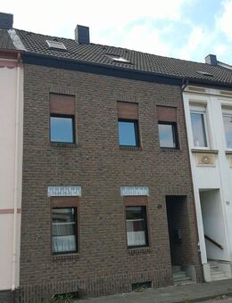 Einfamilienreihenhaus mit Anbau, Keller und Garten in verkehrsgünstiger Vorstadtlage - Jüchen