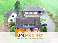 3 Häuser - eine Kapitalanlage! In Achim-Borstel mit 4 Garagen & Weideland! - Achim