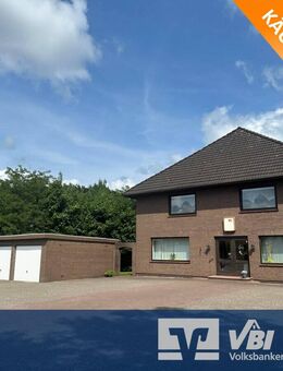 Sandhausen | Attraktives Zweifamilienhaus mit Gewerbeeinheit in ruhiger Lage - Osterholz-Scharmbeck